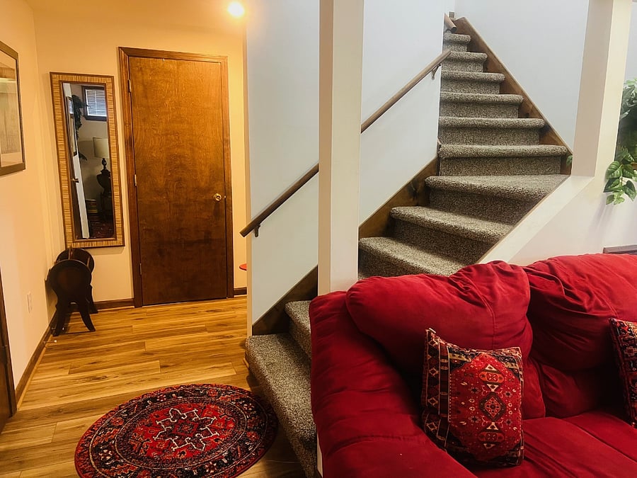 Stairs up to main floor