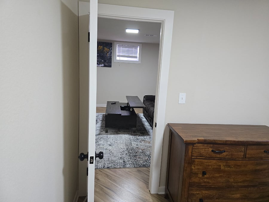 King bedroom downstairs looking into living room. 