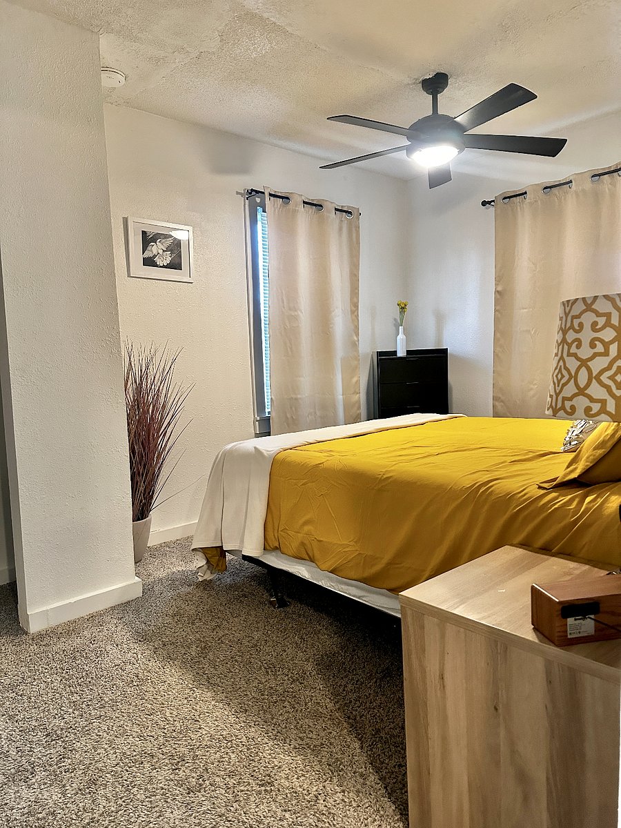 The "Golden Room" is our Queen Size bed with side table, lamp, bluetooth speaker, closet & small dresser