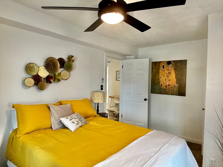 The "Golden Room" is our Queen Size bed with side table, lamp, bluetooth speaker, closet & small dresser. 