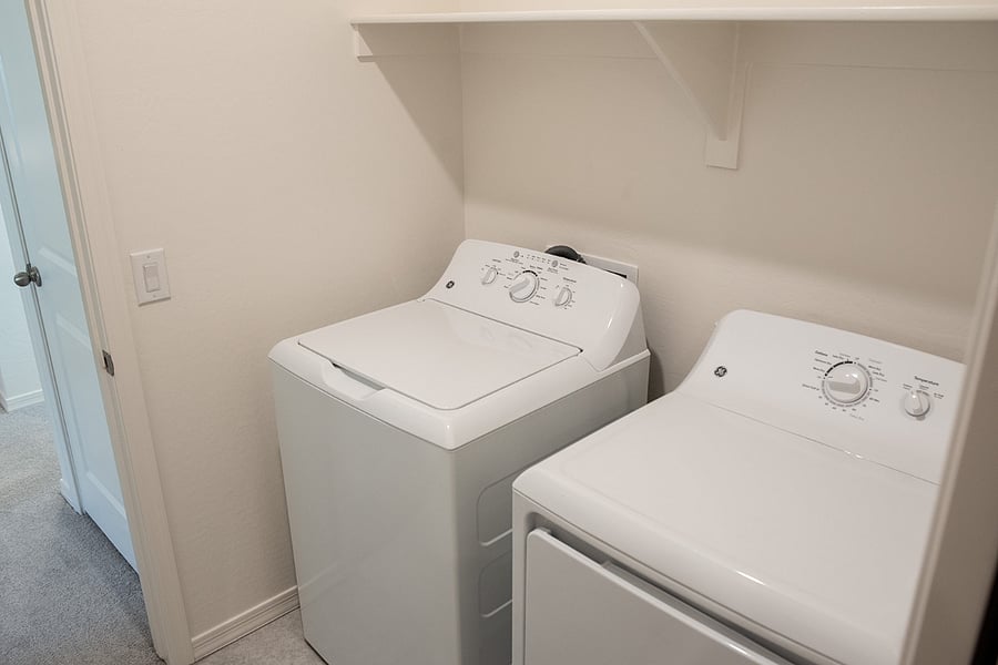 laundry room with new appliances
