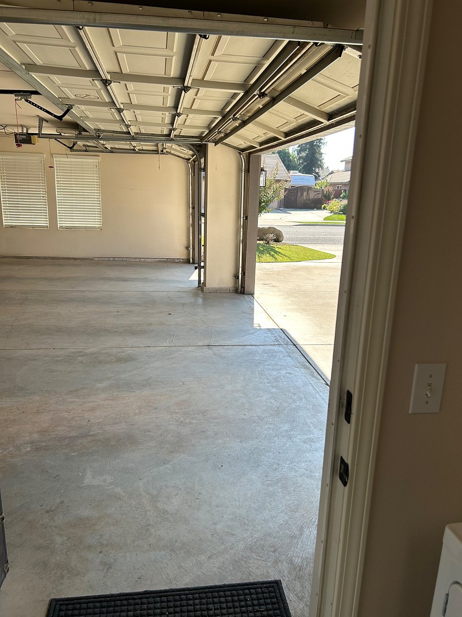 View from laundry room door to garage.