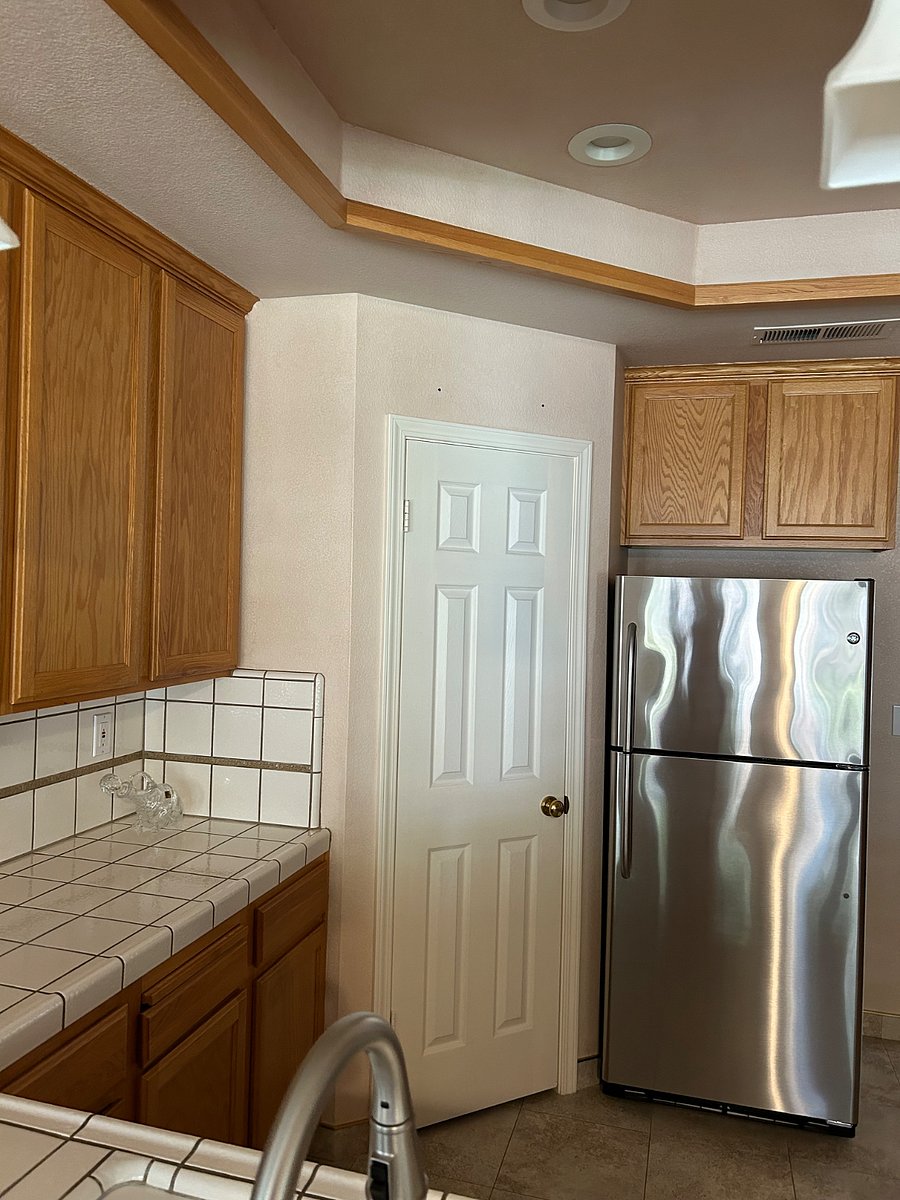 Shared kitchen with full size refrigerator and pantry.