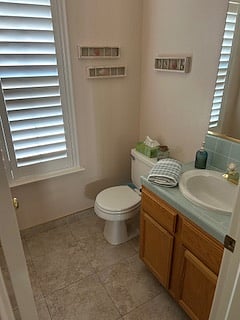 Shared half bathroom.