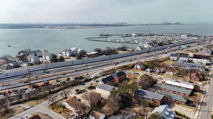 Aerial view of the surrounding area near the water, showcasing convenient access to main roads and nearby attractions. A great location for exploring the city while staying close to scenic waterfront views.