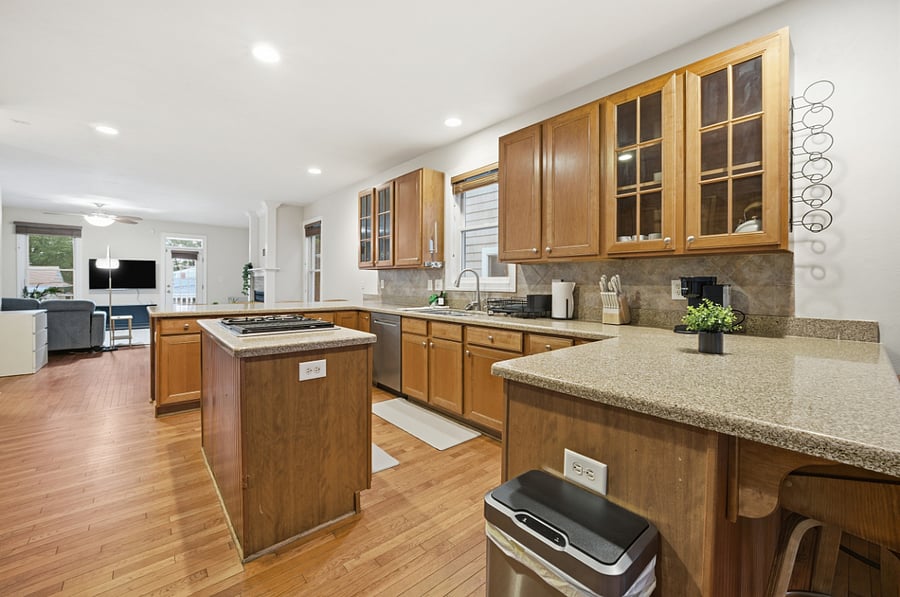 Kitchen with granite countertops and ample cabinetry