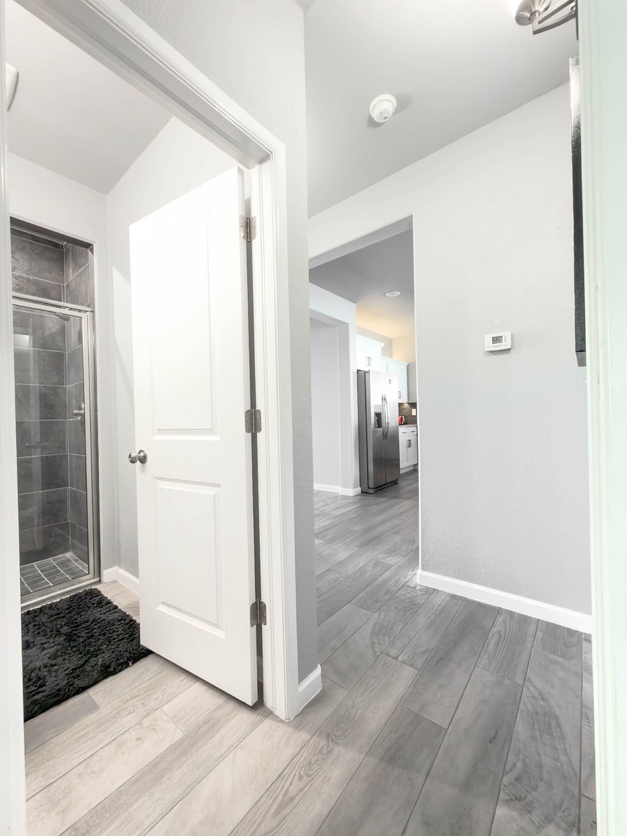 Hallway leading to kitchen from 3rd bedroom