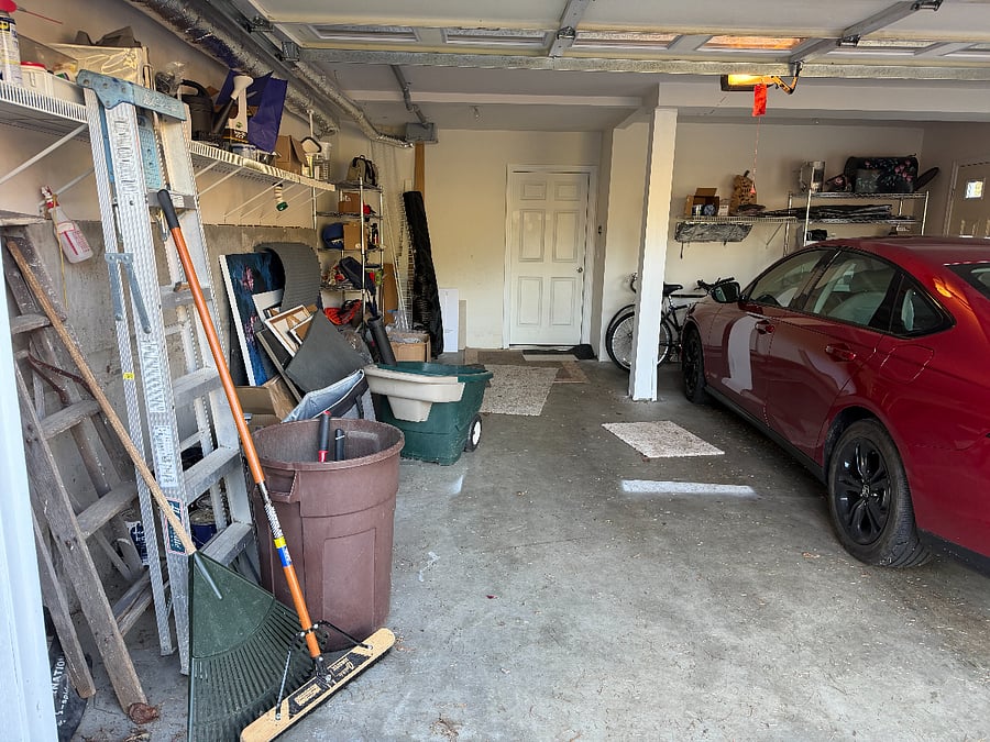 garage storage and 2nd entrance to floor in back.