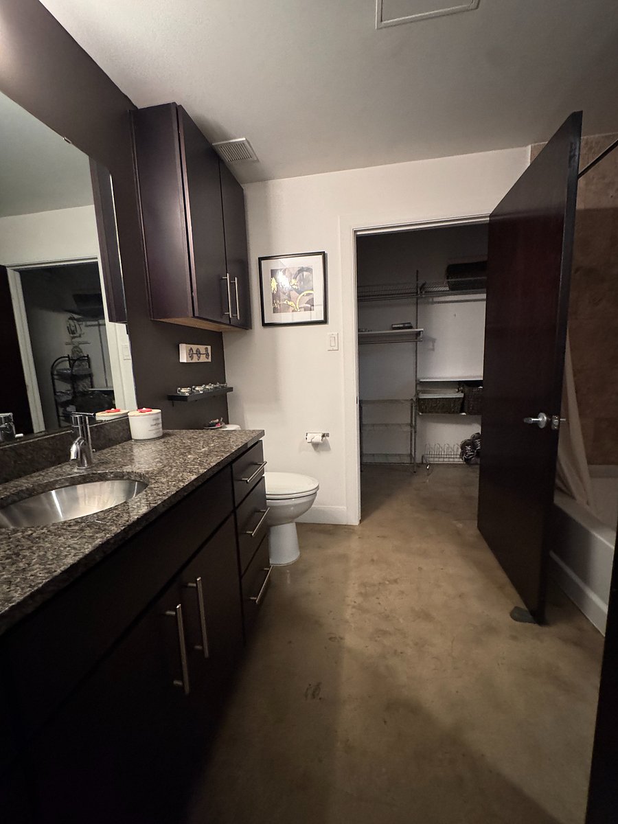 Entry to the walk-in closet from bathroom and also the bedroom