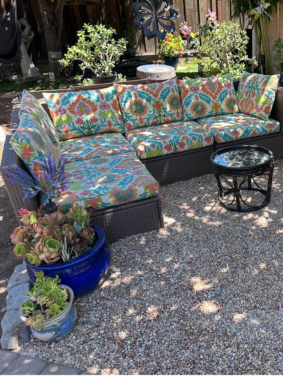 One of three seating in the back yard area to enjoy