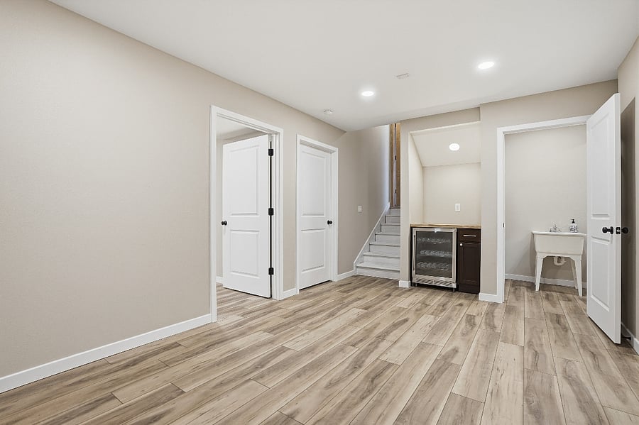 The basement has been newly refinished and can serve as a flex space for fitness/yoga, work space or extra living space or bedroom.