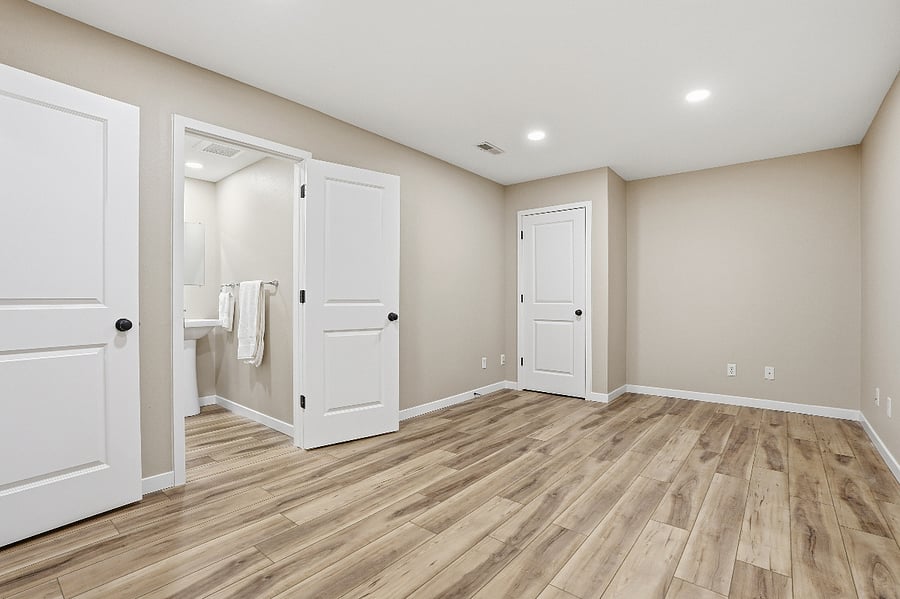 The beautiful space features new luxury vinyl flooring and a built-in beverage fridge.