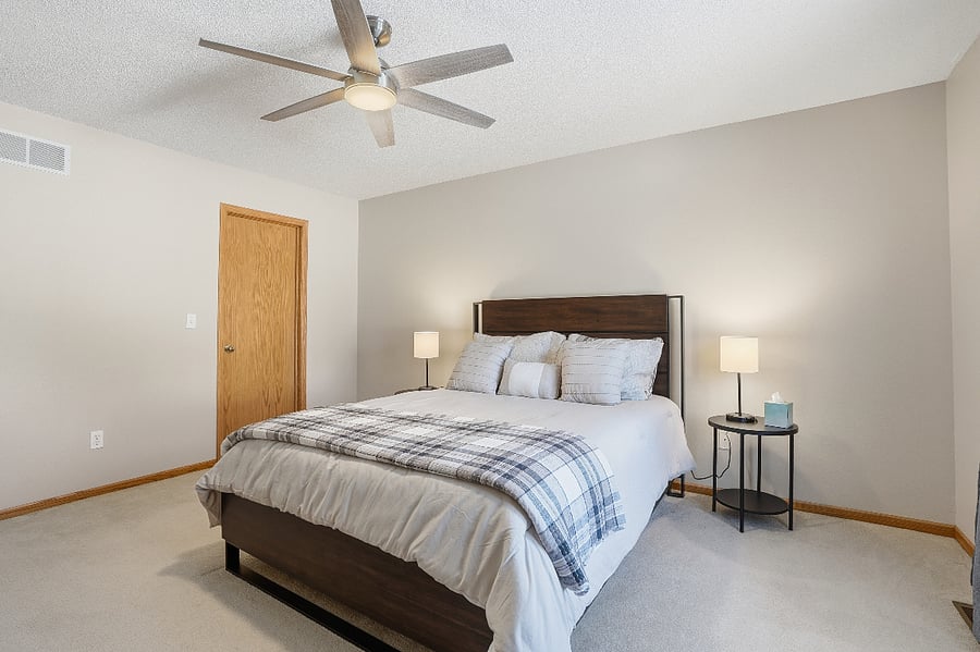 Another view of the master bedroom with brand new furniture and mattresses for a cozy and relaxing stay.
