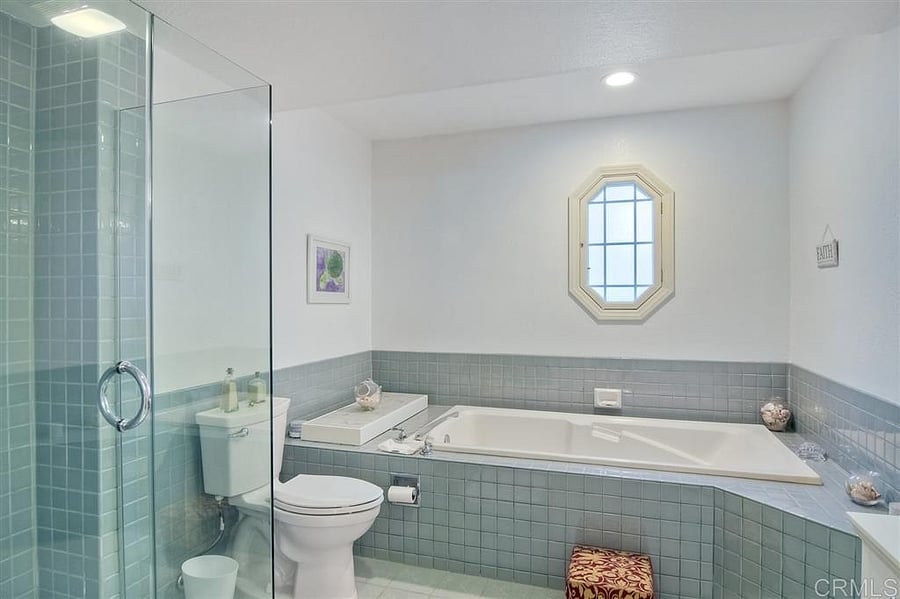 Master Bathroom with walk in shower and jetted bathtub