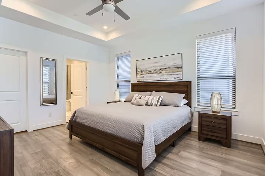 Primary bedroom with king bed with TV 