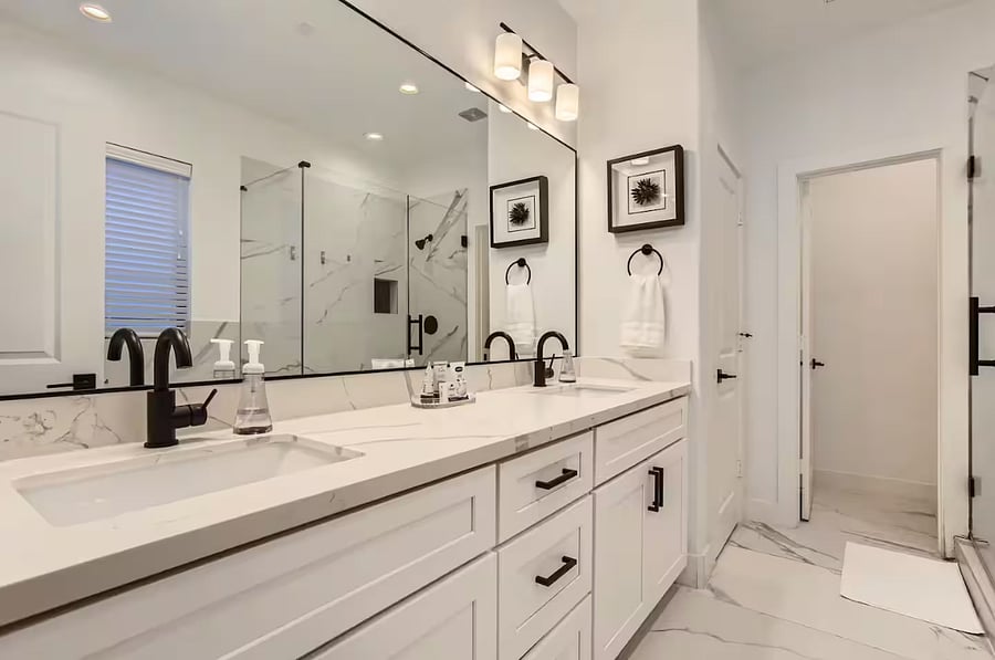 Primary bedroom features 2 large sinks 