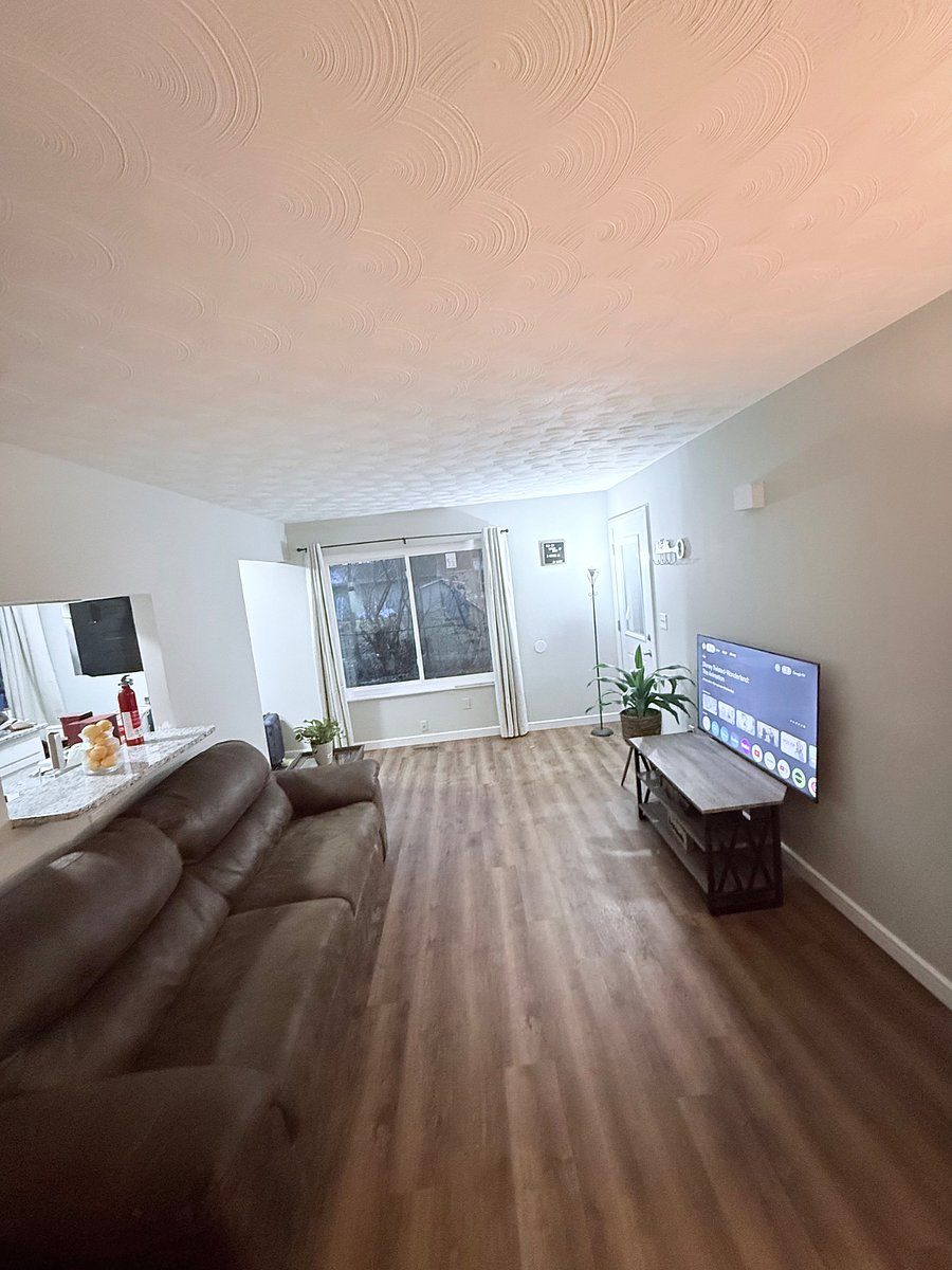 Entryway Living room with a view to the Kitchen 