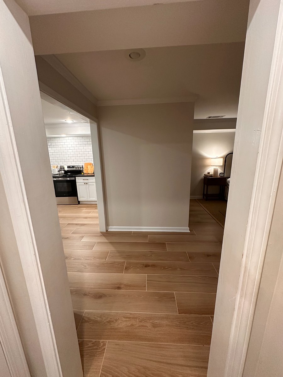 hallway from laundry to bedroom and kitchen
