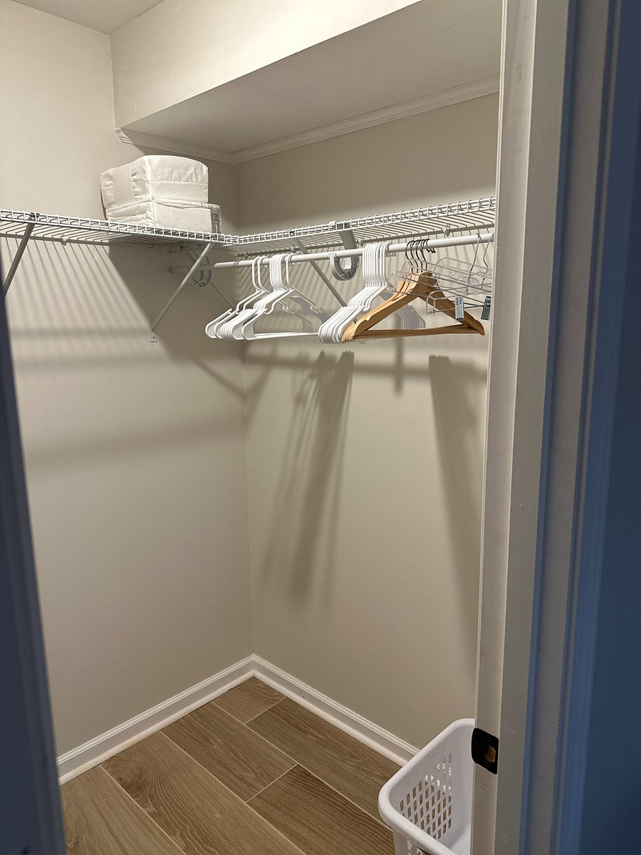 Walk-in closet in bedroom. 