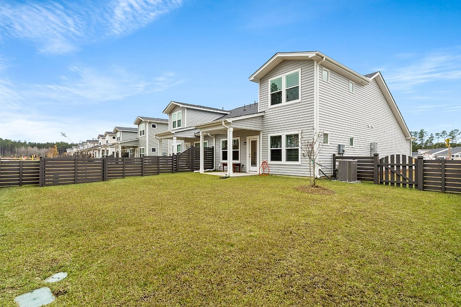 Covered patio.  Lawn care included in the rent.