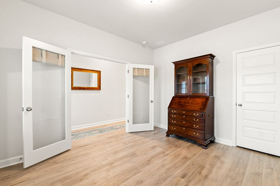 3rd bedroom with closet.  Currently set up as a sitting room.