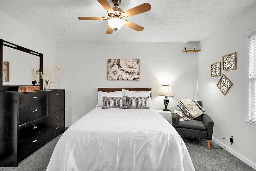 Double bed in third bedroom, dresser, TV 