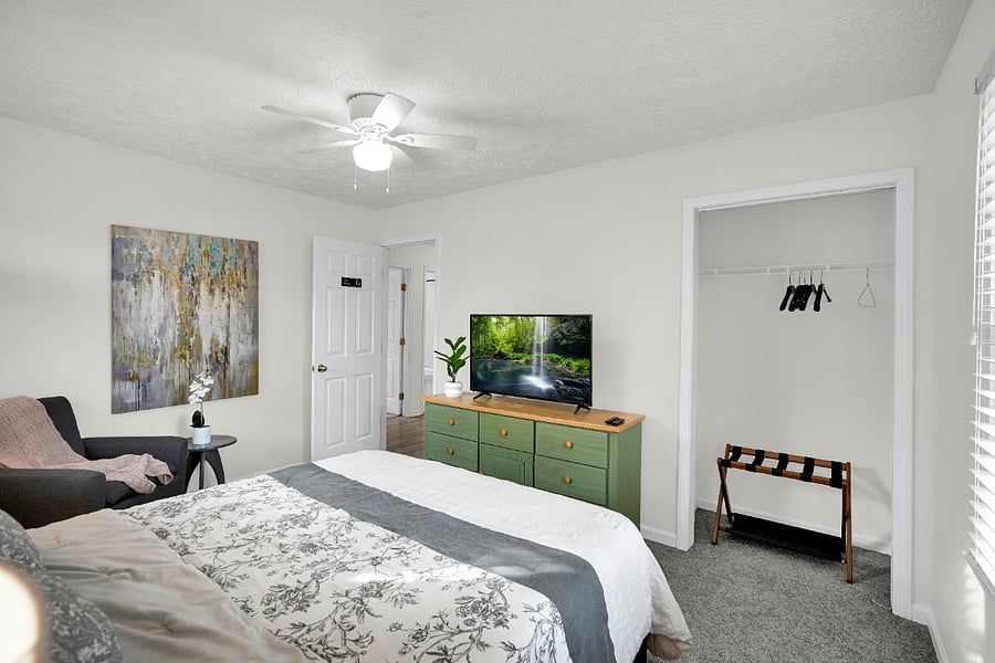 Queen bed in the second bedroom, with space to spread out