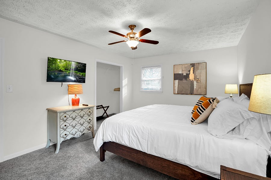 Spacious primary bedroom with King bed