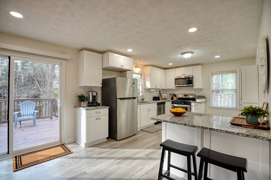 Open kitchen leads out to the beck deck.