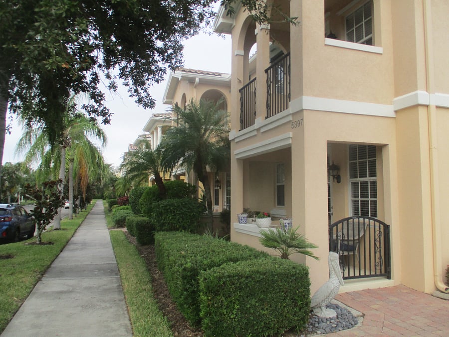 sidewalk in front of townhome