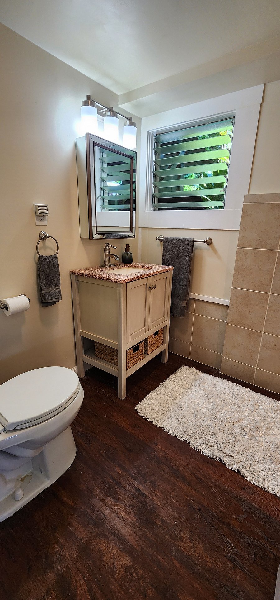 vanity with granite counter top