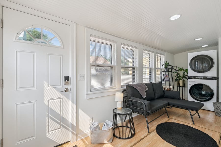 Sunroom for all Entry/Exiting. Laundry unit with laundry supplies available.