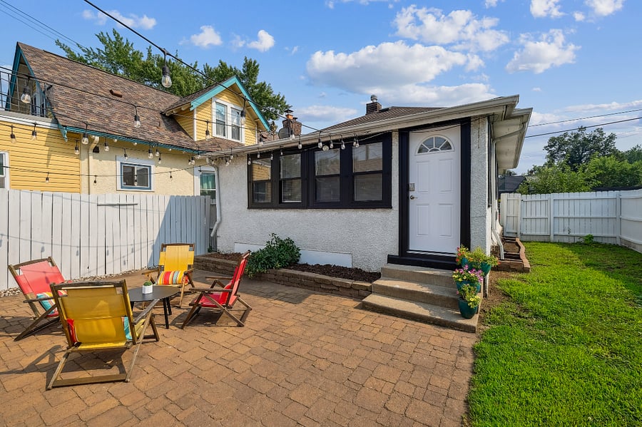 View of entrance/exit tucked in back of property. Private patio and yard, fully fenced.