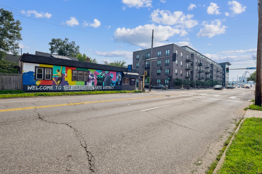 View of Lowry Ave from front of the home. You are across the street from GT Atristry, Antique shop, the iconic Lowry Bridge, The Buttered Tin, Hey Ya'll Taco Bar, Violet Wines + More within walking distance!
