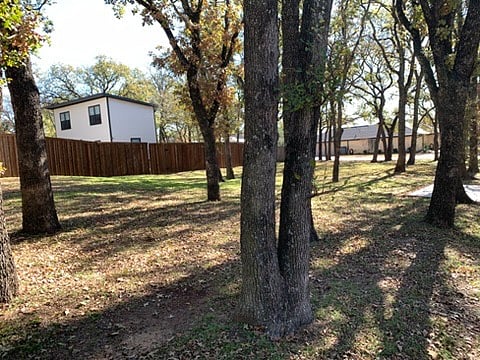 Apartment/casita from front side yard showing gate.