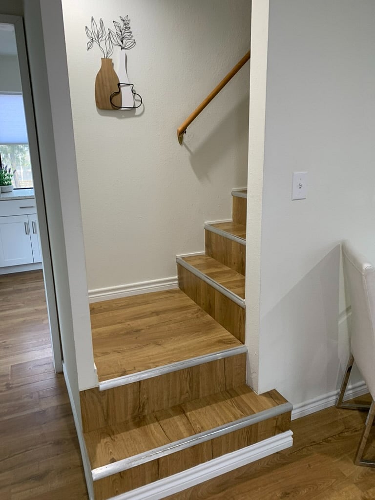 Stairs going up to bedroom.