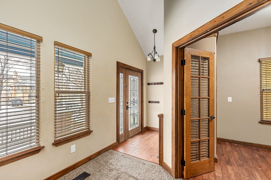 Flexible Office Workspace or Additional Bedroom overlooking the beautiful Historic District street, featuring mature trees, charming historic homes, and abundant natural light perfect for remote work, traveling professionals, or extended stays.