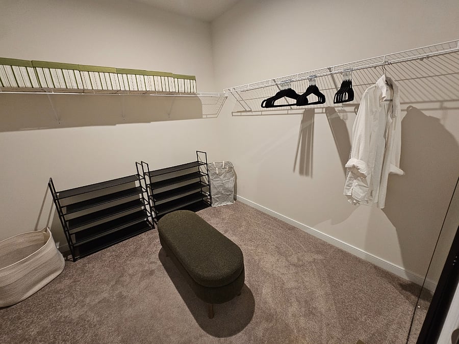 Green Unit walking closed with plenty of storage and a full size mirror
