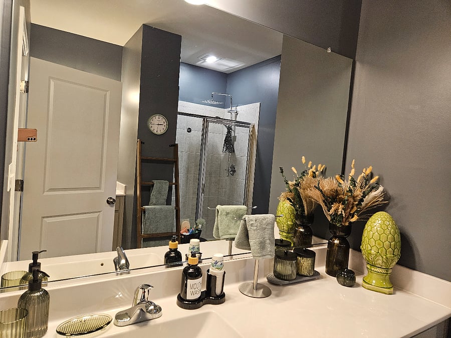 Green Unit Privet Bathroom with 2 sinks, makeup area and a walking shower with a built in bench 