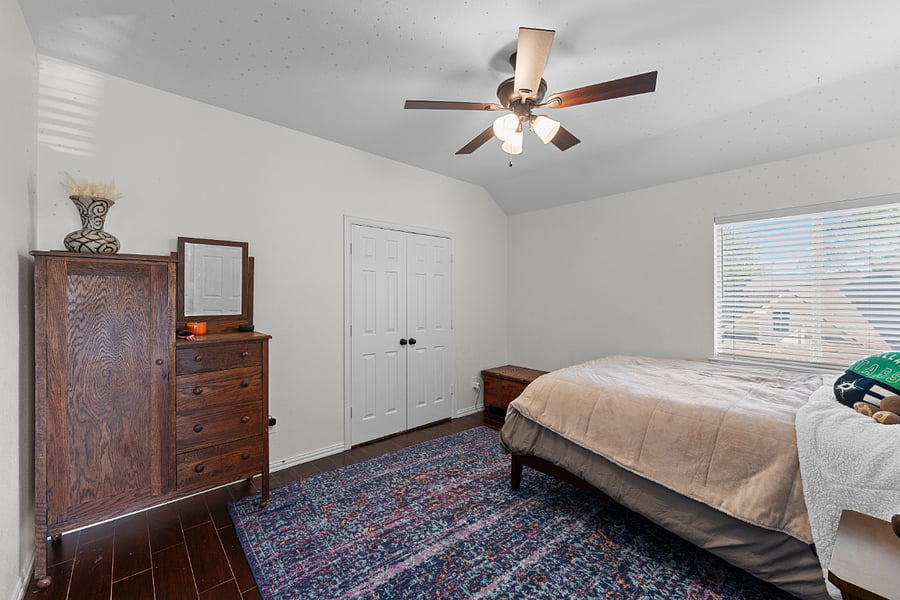 Comfortable queen bedroom with a peaceful setup.
