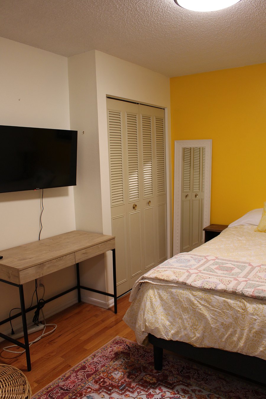 Primary bedroom desk and smart TV
