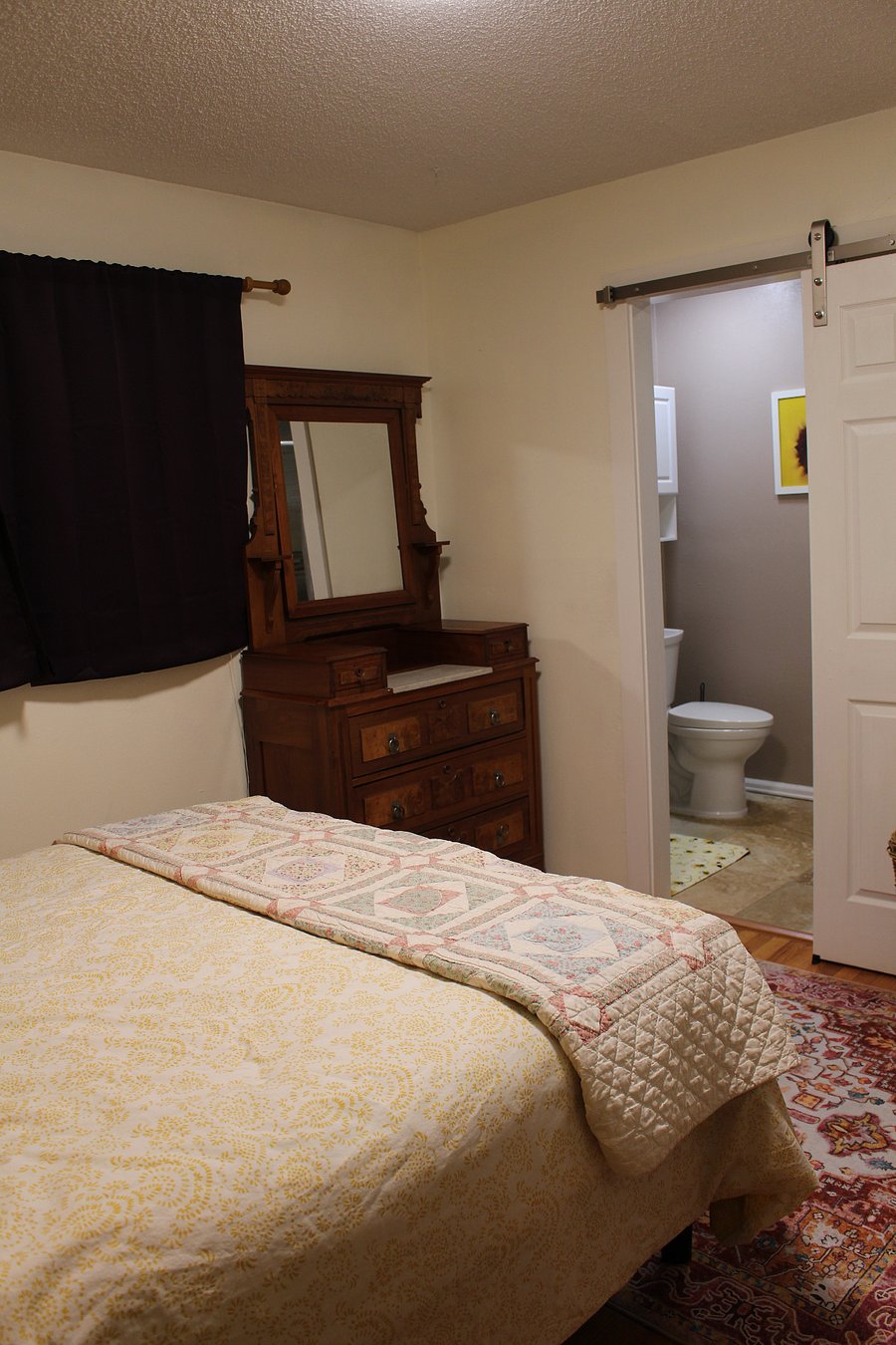 Primary bedroom with attached full bath