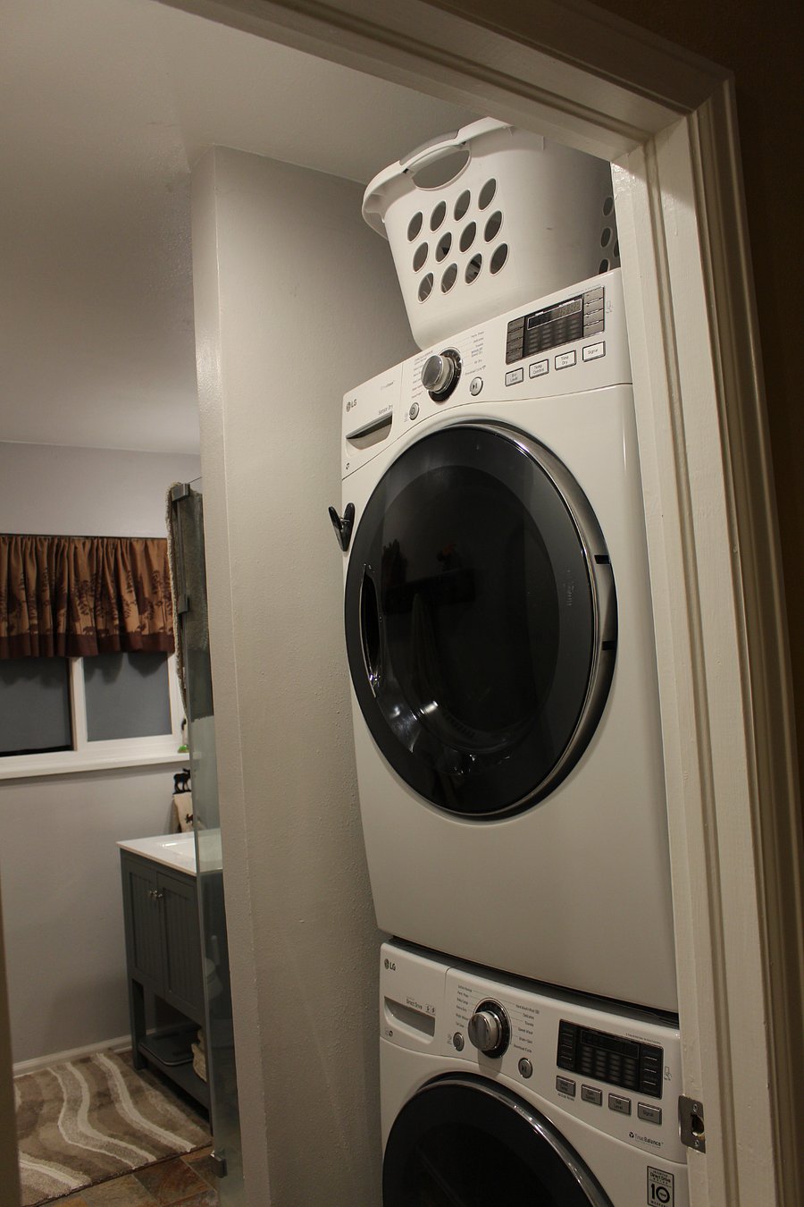 Full size washer and dryer in hall bathroom