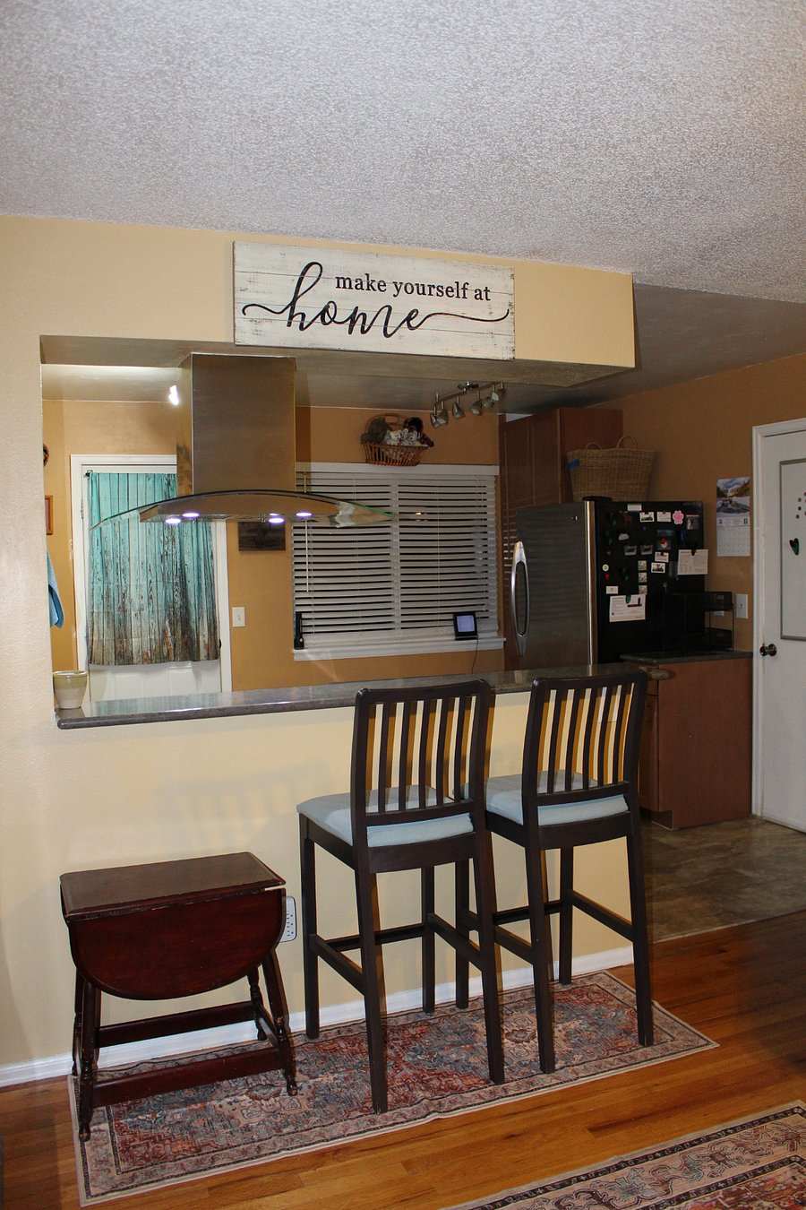 Bar seating. Window looks out on backyard
