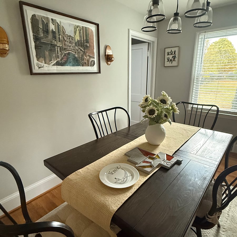 Another angle of the dining room. This room is multifunctional. It can be used for a workspace. Many guests have used it for the perfect zoom calls.   The window in the dining room facing the backyard, full of greenery. Serene.    In the dining room, you can walk upstairs to the second floor or you can shut the door. 