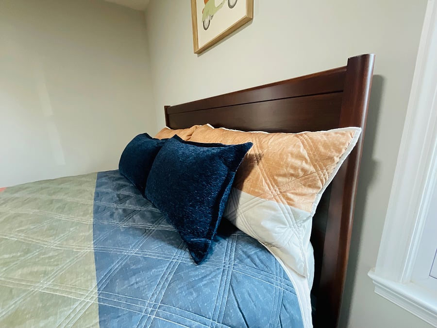 2nd Bedroom.  Mid Century flat bed with new Queen mattresses and bed spring.  Pillows can be used as needed.  Located on first floor. 