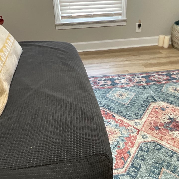 Another angle of the 4th bedroom upstairs. Rug is brand new and comfortable.   Pillow can be used for decoration or to lay on.  Spacious room.  
