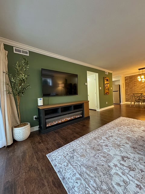 Living Room w/ TV and fireplace