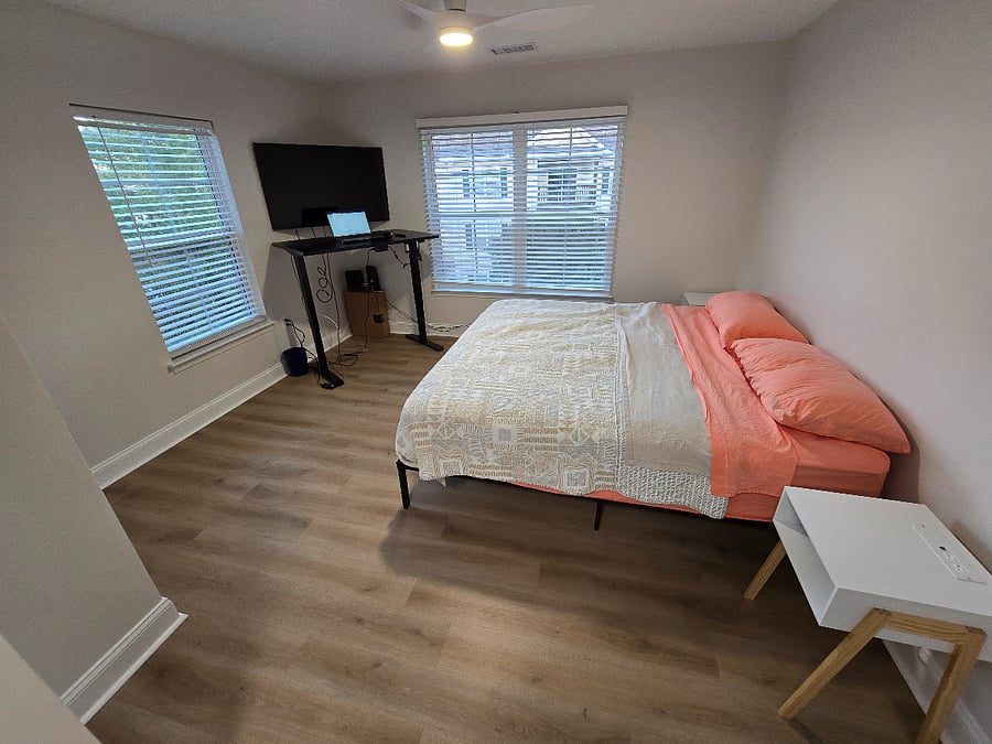 Master Bedroom (king size bed, 2 closets with drawers, standing desk, private master bathroom)