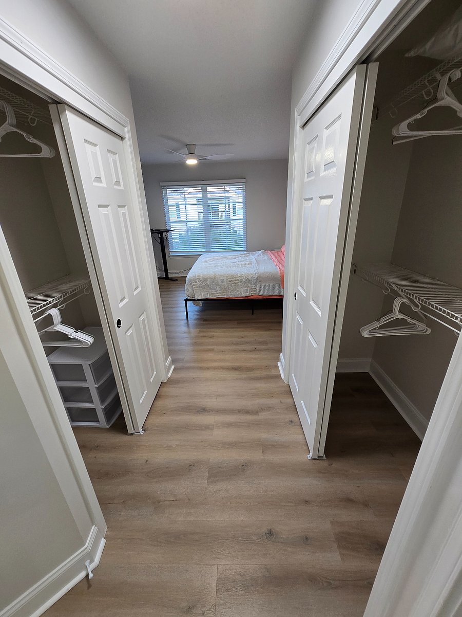 Master Bedroom (king size bed, 2 closets with drawers, standing desk, private master bathroom)